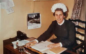 Mt Great-Aunt, Mrs Champney, in her 1950s nursing outfit at her desk. She was the first one to own the recipe book that has the recipes of Yorkshire in it.